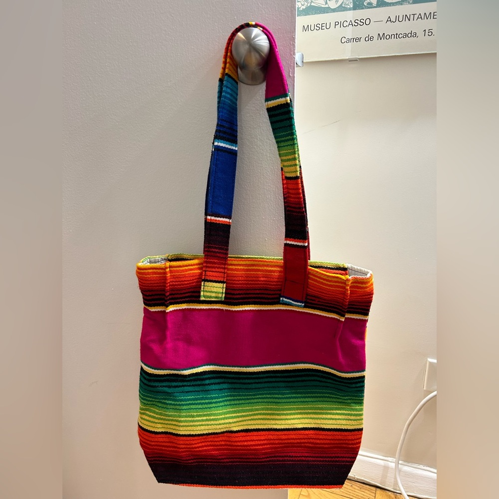 Mexican pattern tote bag, no pockets and some wear on one side (shown in photo)